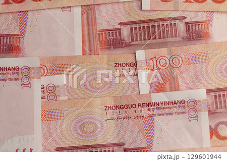 Chinese national money used for payment, the government's red currency of one hundred yuan used in the Chinese state 129601944