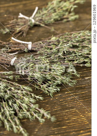 dry thyme tied together in bundles, aromatic spices of dried thyme for use in cooking and folk medicine 129601969