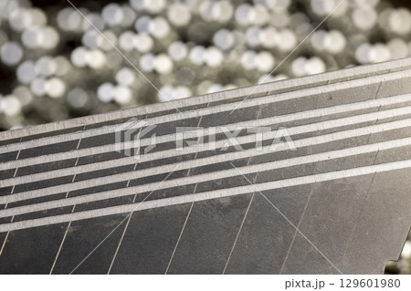 blade for the construction of a multifunctional knife for use in construction work, close up 129601980