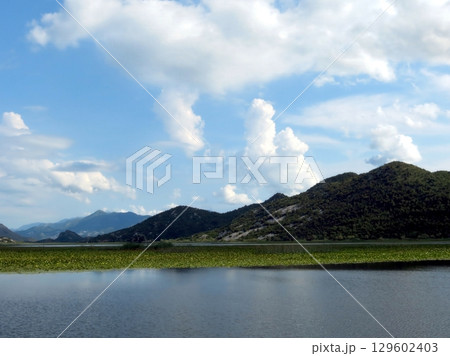 Explore the Serene Beauty of Skadar Lake, Montenegros Tranquil Waters and Lush Landscapes 129602403