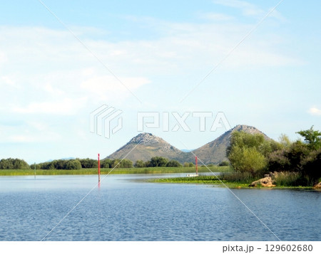 Scenic View of Skadar Lake in Montenegro Showcasing Peaceful Waters and Rolling Hills 129602680