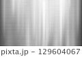 Brushed Metal Texture Background with Vertical Light Reflections 129604067