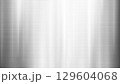 Brushed Metal Texture Background with Vertical Light Reflections 129604068