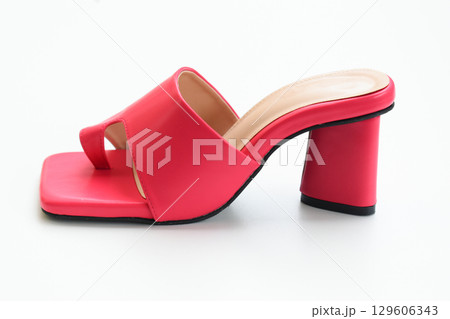 beautiful pink leather heel shoe isolated on white background beautiful pink leather heel shoe isolated on white background 129606343