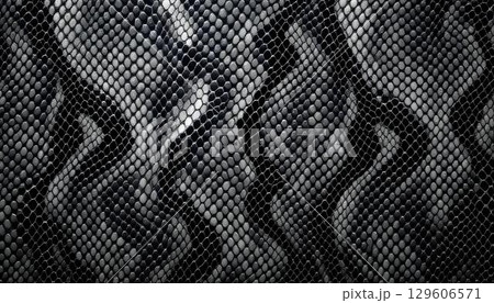 Black and white seamless snake skin texture, emphasizing the unique patterns and scales in a striking monochrome design 129606571