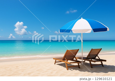 青い海と白い砂浜に並ぶビーチチェアの夏風景 129610121