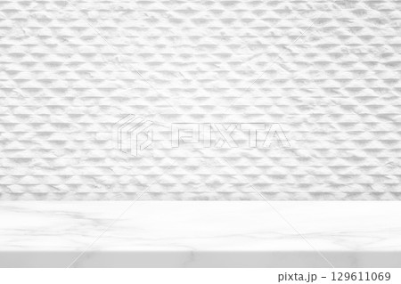 Marble Table Top with White Textured Background Featuring a Geometric Pattern Marble Table Top with White Textured Background Featuring a Geometric Pattern 129611069