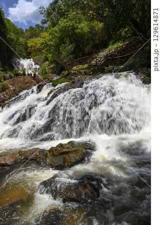 Datanla Waterfall in Dalat among the green rainforests in Southeastern Vietnam 129614871