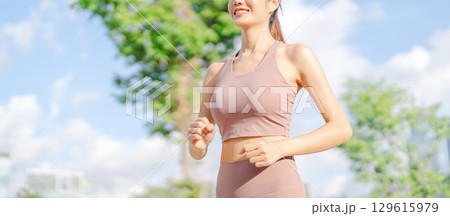 Southeast asian woman smiling running jogging at outdoors park exercise wear sports outfit Southeast asian woman smiling running jogging at outdoors park exercise wear sports outfit 129615979