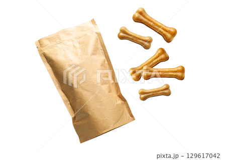 Brown bag and bone-shaped dog treats, isolated on white, PNG 129617042