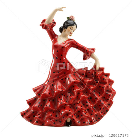 Porcelain figurine of a spanish flamenco dancer in a traditional red polka dot dress pose 129617173