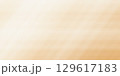 Abstract pastel beige gradient background with grainy texture. 129617183