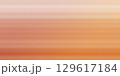 Abstract orange gradient background with grainy texture. 129617184