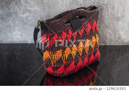 Women's handbag brown color hand knitted with orange-red weaves and long handle Women's handbag brown color hand knitted with orange-red weaves and long handle 129618383