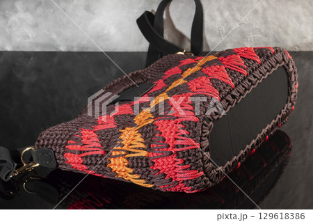 Women's handbag brown color hand knitted with orange-red weaves and long handle 129618386