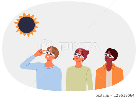 People view solar eclipse using disposable glasses to observe rare astronomical phenomenon 129619064