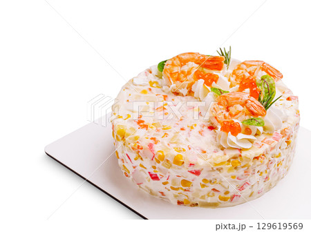 Colorful seafood cake decorated with shrimp and vegetables for special occasions 129619569