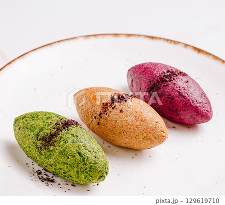 Colorful traditional vegetable Kibbeh Trio on Plate Colorful traditional vegetable Kibbeh Trio on Plate 129619710