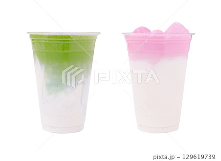 Delicious layered drinks featuring matcha and fruit flavors from a cafe 129619739