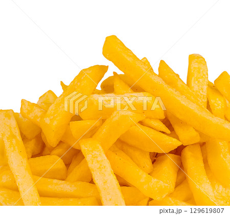 Golden crispy fries piled high on a white background ready for a meal 129619807