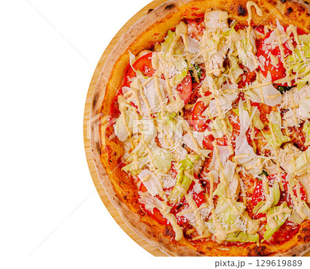 Delicious pizza topped with fresh ingredients and cheese Delicious pizza topped with fresh ingredients and cheese 129619889