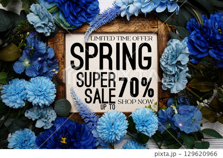 Spring Sale 70% Promotion and Marketing with flowers bouquet decoration on wooden background Spring Sale 70% Promotion and Marketing with flowers bouquet decoration on wooden background 129620966