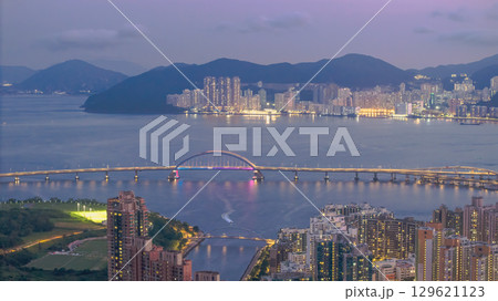 Aug 14 2025 Peaceful waterfront with sea, sky, and buildings Aug 14 2025 Peaceful waterfront with sea, sky, and buildings 129621123