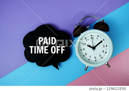 Paid Time Off text on speech bubble with alarm clock top view on blue, purple and pink geometric background Paid Time Off text on speech bubble with alarm clock top view on blue, purple and pink geometric background 129622830