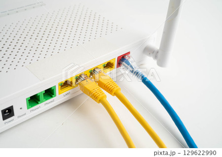 Ethernet cable with wireless router connect to internet service provider network. 129622990