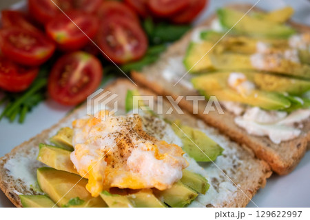 Avocado Toast with Cherry Tomatoes 129622997