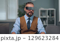 A man is watching holographic screens. 129623284