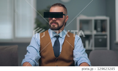 A man is watching holographic screens. A man is watching holographic screens. 129623285
