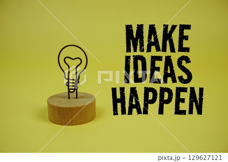 Make Ideas Happen text message on yellow background 129627121