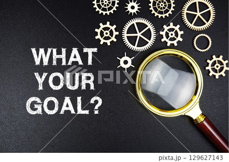 What Your Goal? text message with magnifying glass on black background 129627143