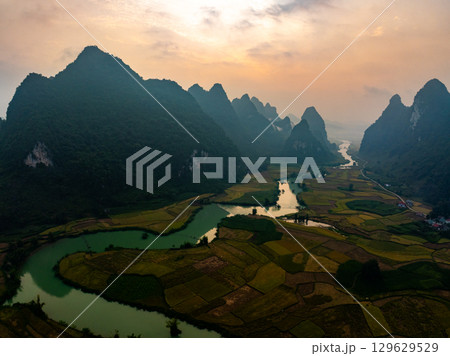 Drone aerial view of landscape mountains view in sunrise or sunset time,High angle view over countryside at northern Vietnam Drone aerial view of landscape mountains view in sunrise or sunset time,High angle view over countryside at northern Vietnam 129629529