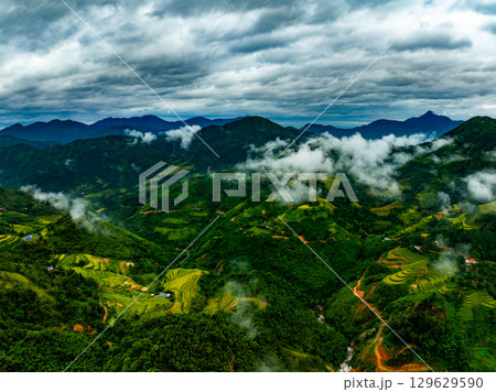 Drone aerial view of landscape mountains view in sunrise or sunset time,High angle view over countryside at northern Vietnam 129629590