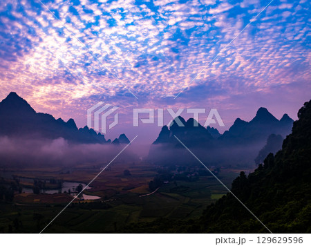 Drone aerial view of landscape mountains view in sunrise or sunset time,High angle view over countryside at northern Vietnam Drone aerial view of landscape mountains view in sunrise or sunset time,High angle view over countryside at northern Vietnam 129629596