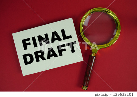 Final Draft text written on paper with magnifying glass Final Draft text written on paper with magnifying glass 129632101
