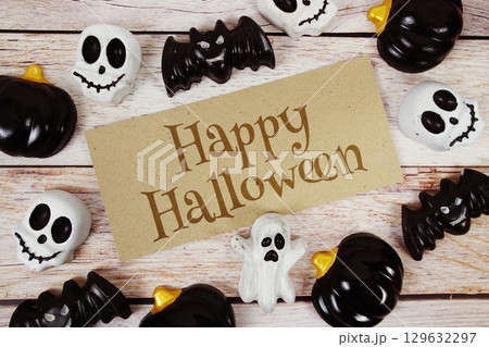 Happy Halloween text with element decorations on orange background 129632297