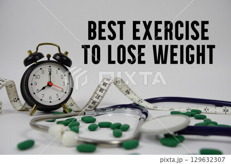 Best Exercise To Lose Weight text with Stethoscope, medicine, measuring tape and alarm clock on white background 129632307