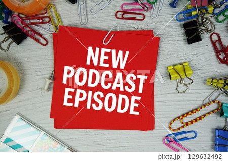 New Podcast Episode text on stick note with stationery on concrete background New Podcast Episode text on stick note with stationery on concrete background 129632492