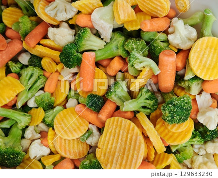 assorted frozen vegetables. Healthy food, vegetarian cuisine. chopped frozen vegetables mix, broccoli, carrots 129633230