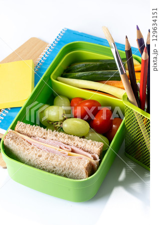 Healthy Lunchbox for school with sandwich,fruit and vegetables 129634151