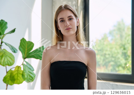 Portrait of beautiful fashionable young blonde woman with long hair 129636015