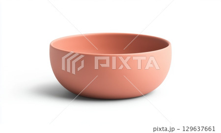 Round ceramic bowl in guava color with matte finish and smooth minimal design isolated on white background for branding, tableware and lifestyle stock imagery 129637661
