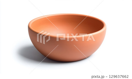 Round ceramic bowl in guava color with matte finish and smooth minimal design isolated on white background for branding, tableware and lifestyle stock imagery 129637662