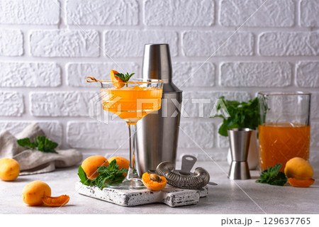 Fresh apricot Bellini cocktail with mint 129637765