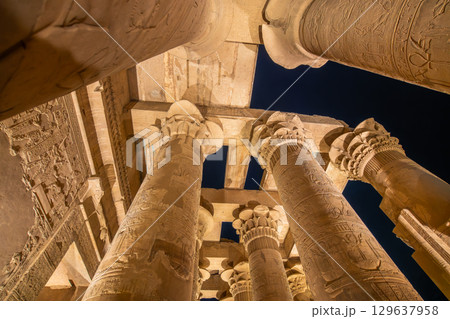 View of the Illuminated Columns and Ceilings of the Temple of Kom Ombo. 129637958