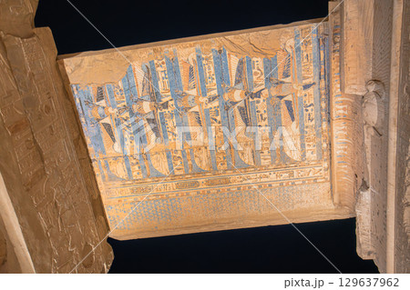 Colorful ceiling paintings at Temple of Kom Ombo with blue hieroglyphs Egypt. 129637962