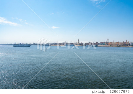 Cruise Ships Approaching Esna Lock on Nile River Egypt. Cruise Ships Approaching Esna Lock on Nile River Egypt. 129637973
